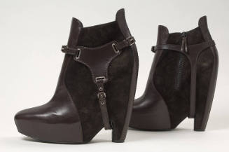 Brown leather and suede high platform ankle boot with buckle stirrups 