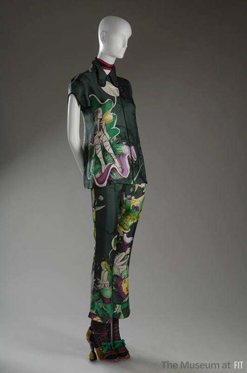 Ensemble of green, yellow and purple fairies and floral print short sleeve blouse with flared t…