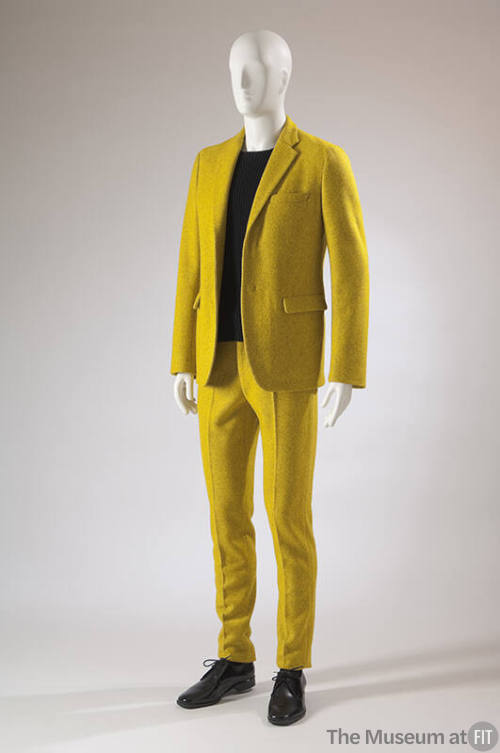 Yellow wool suit with long sleeve jacket with flap pockets and matching slim pants
