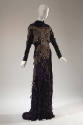Purple long sleeve, floor length evening gown with gold metallic embroidered pheasant bird at f…