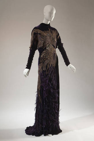 Purple long sleeve, floor length evening gown with gold metallic embroidered pheasant bird at f…