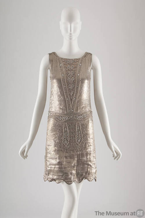 Silver metallic short sleeveless evening dress with floral brocade pattern