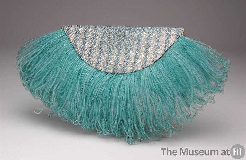 Turquoise and silver fabric semi-circle bag trimmed with turquoise feathers