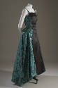Sleeveless evening gown black taffeta with metallic green brocade side panels and train