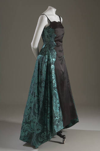 Sleeveless evening gown black taffeta with metallic green brocade side panels and train