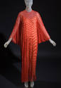 Red beaded floor length marquisette, long sleeves and coorinating underslip