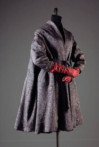 Grey silk flared tent coat with jacquard floral pattern dressed with red elbow length gloves