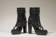 Black leather platform high heel ankle boots with open toe and front straps