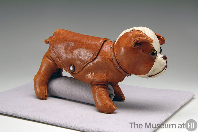 Brown and white leather dog shaped clutch bag with stud collar, side snap closure