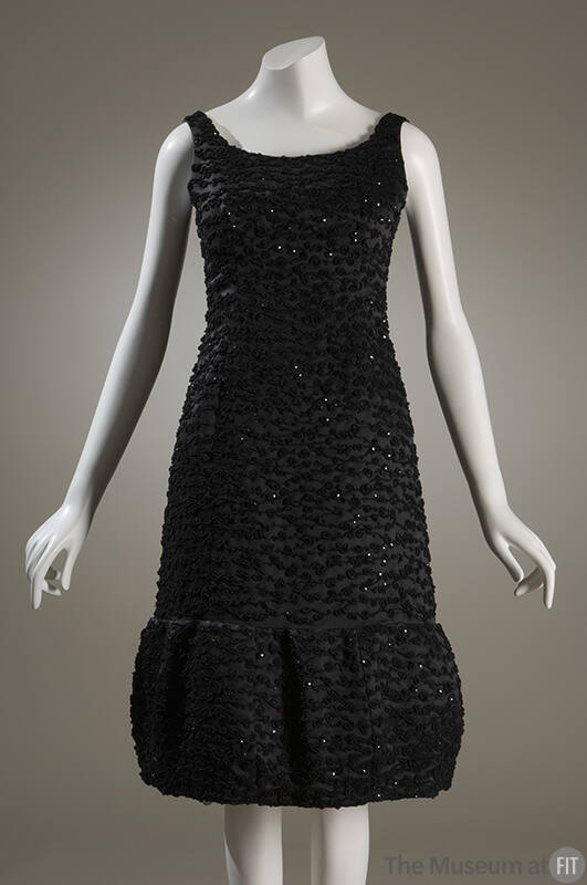 Black satin dress with jet bead and black sequin trim all over