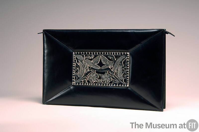 Black leather rectangular clutch bag with floral ornament in center