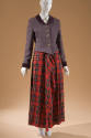 Ensemble of mauve jacket with gold buttons, plum velvet collar and cuffs and floor length red, …