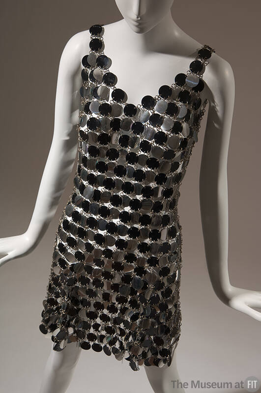 Sleeveless chain mail mini evening dress with alternating black and silver circles
