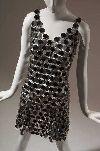 Sleeveless chain mail mini evening dress with alternating black and silver circles