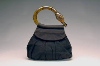 Dark brown suede pouch handbag with tortoise shell flamingo head and neck shaped handle