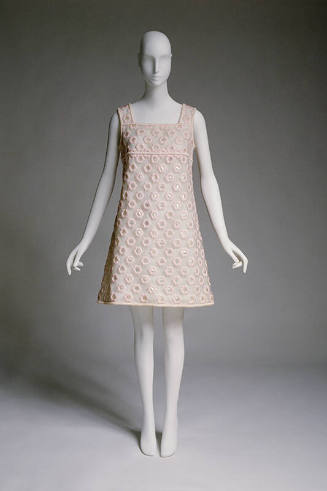 White sleeveless A-line shift mini dress with pink satin overlay of daisies and paillette cente…