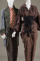 Left: Grey, green, black striped jacket, orange and white squiggle design top, grey, black and …