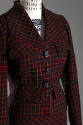 Jacket detail of black and red wndowpane check suit