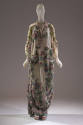 Tan silk chiffon ankle length dress with appliquéd pink, lavendar and green flowers and leaves …