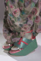 Green satin platform sandals with pink patent leather ankle straps and bow detail