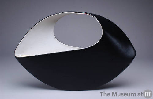 Black and white leather oval shaped hand bag