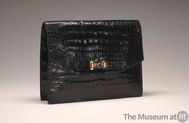 Black alligator clutch envelope style handbag with gold, tortoise and sapphire closure