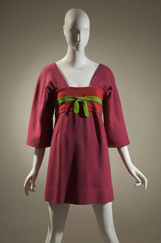 Red and purple checked kimono mini-dress with circular patterned band around bust and yellow-gr…