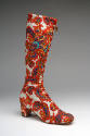 Calf length heeled boot with paisley pattern in orange, dark red, royal blue, turquoise, yellow…