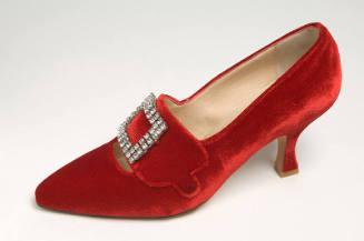 Red velvet evening high heel shoe with rectangular rhinestone buckle on wide bar; pointed toe