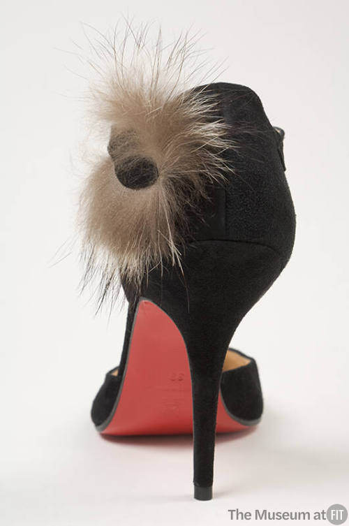Black d'Orsay pumps with fur trim at ankle