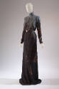 Floor length wool dress with turtleneck and long sleeves with photo print of trees and building…