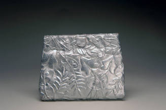 Silver evening pouch embossed in leaf pattern