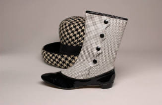 Black and white check hat with black lining, boot with black sole and check details, with butto…