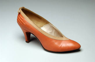 Pink pump with beige collar and pleating at heel