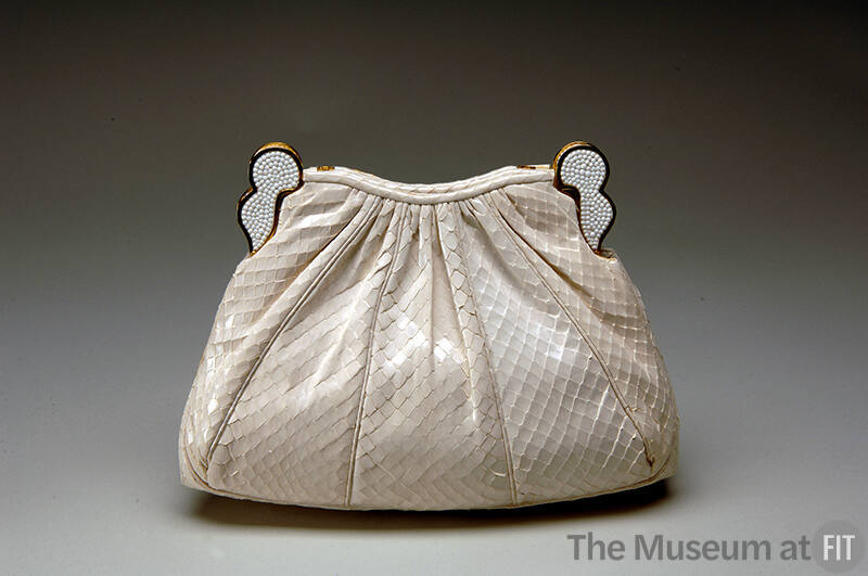 White snakeskin pouch style clutch bag with white beaded ornaments on either side