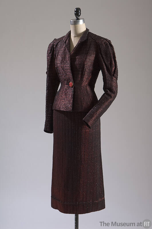 Black and red metallic striped single button jacket and matching skirt 