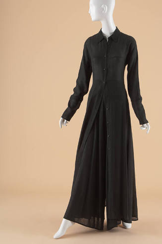 Black long fitted duster with black flared pants