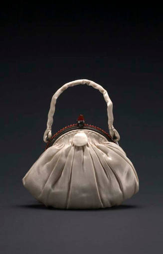 Small ivory shell shaped evening pouch with self handle