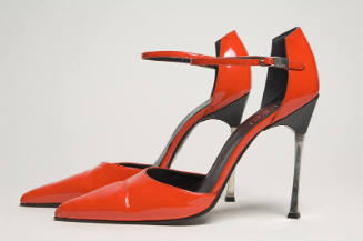 Red patent leather ankle strap sandals with high metal heels