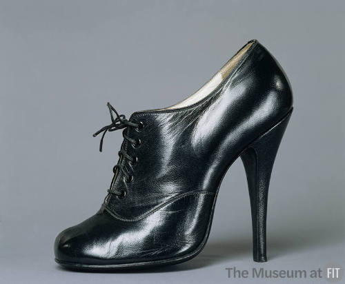 Black leather oxford style lace-up high heel shoes