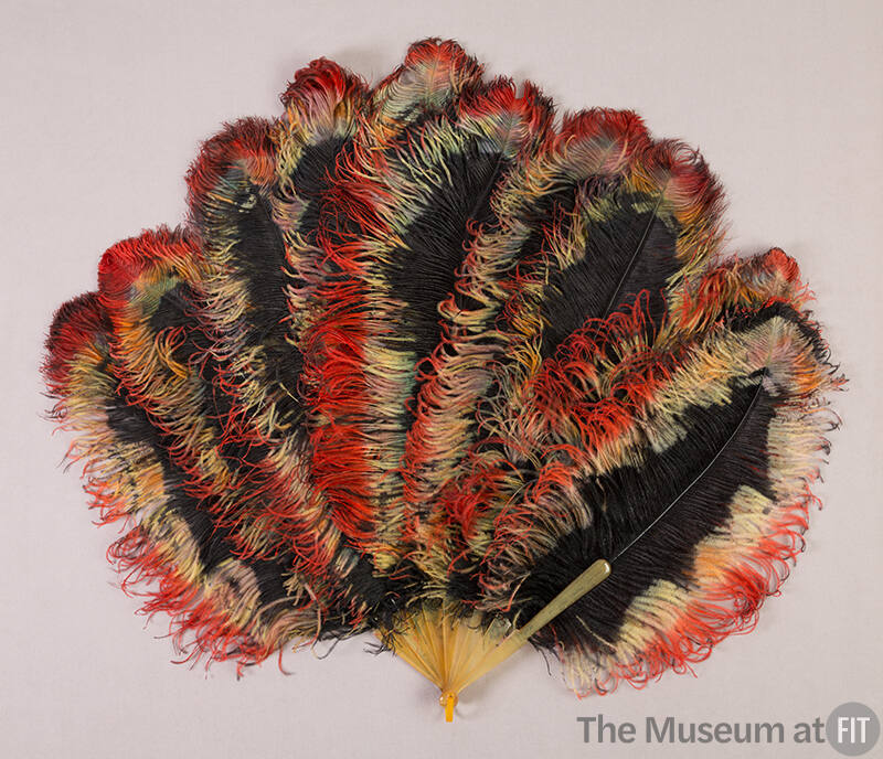 black, white, and red ostrich feather fan