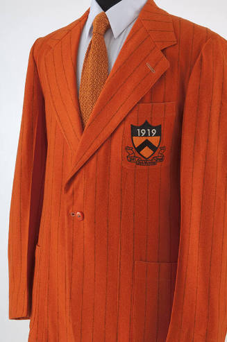 Man's orange Princeton jacket with black pin stripes; breast patch pocket with inisgnia patch: …