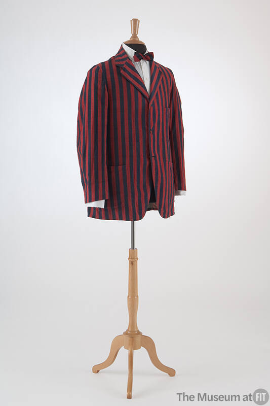 Man’s blue and red vertical striped blazer with three pockets and three button closure dressed …