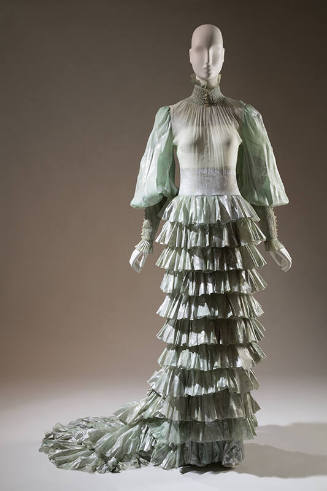 Pale green with silver abstract design silk floor length evening dress, long puff sleeves with …