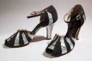 Black and silver open toe high heel ankle strap shoes