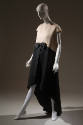 Evening tent dress with white capsleeve bodice and black flared skirt with asymmetrical hem 