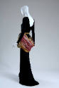 Black long sleeve dress with multicolor draped hip band, low scoop back