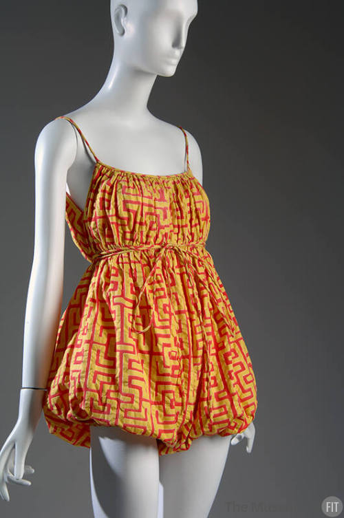 Romper style bathing suit in red and yellow geometric print, spaghetti straps, empire bodice wi…