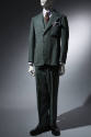 Suit in green and blue tweed; single breasted jacket, cuffed pants 