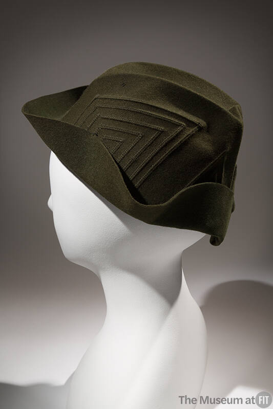 Green felt hat, creased crown with stitched geometric design